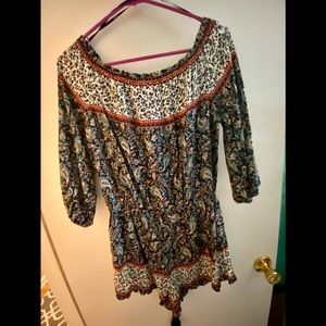 New with tags, blue patterned romper.